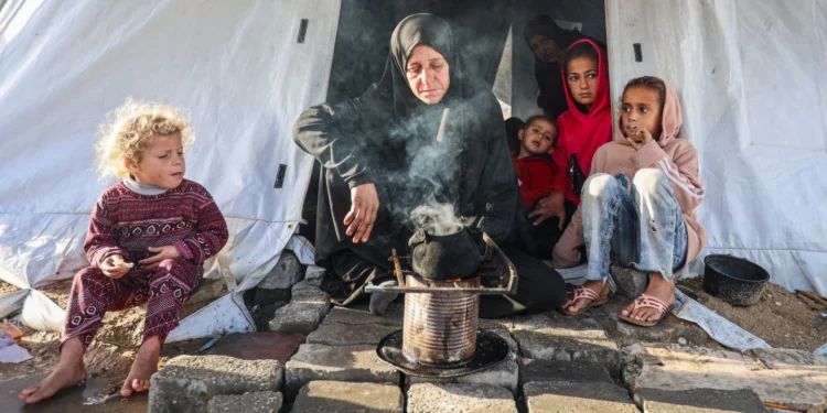 Britain demands Israel reverse ban on aid groups