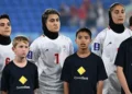 Australia protect Iranian football team