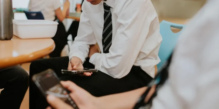 school mobile phone ban England law 2026