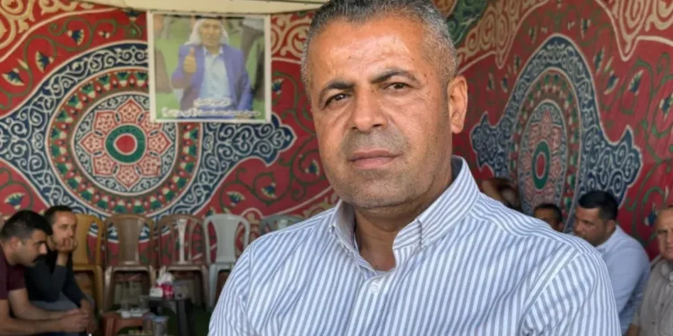 settlers force Palestinian to exhume body May 2026