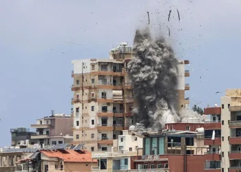 Israel air strikes Tyre Lebanon Iran warning