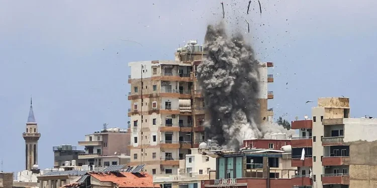 Israel air strikes Tyre Lebanon Iran warning