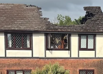 lightning strike roof fire man saves neighbours