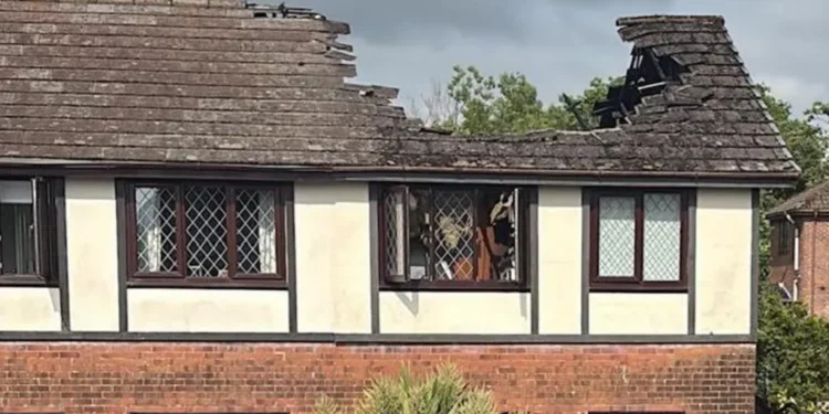 lightning strike roof fire man saves neighbours