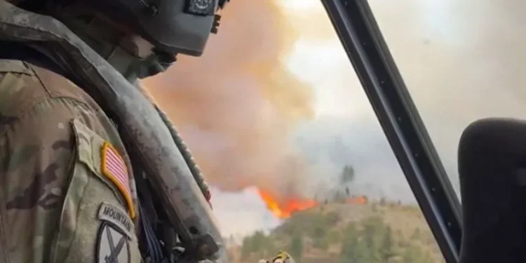 Nearly 90,000 ordered to flee Reno wildfire