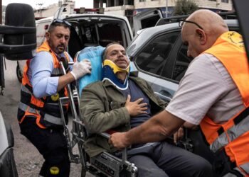 Israeli Settlers Assault Palestinian Photographer