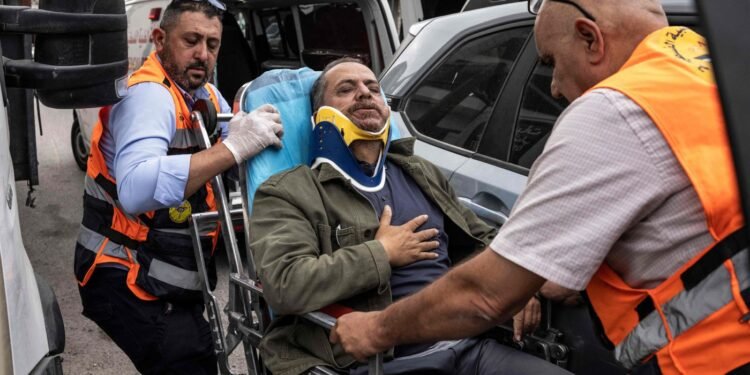 Israeli Settlers Assault Palestinian Photographer